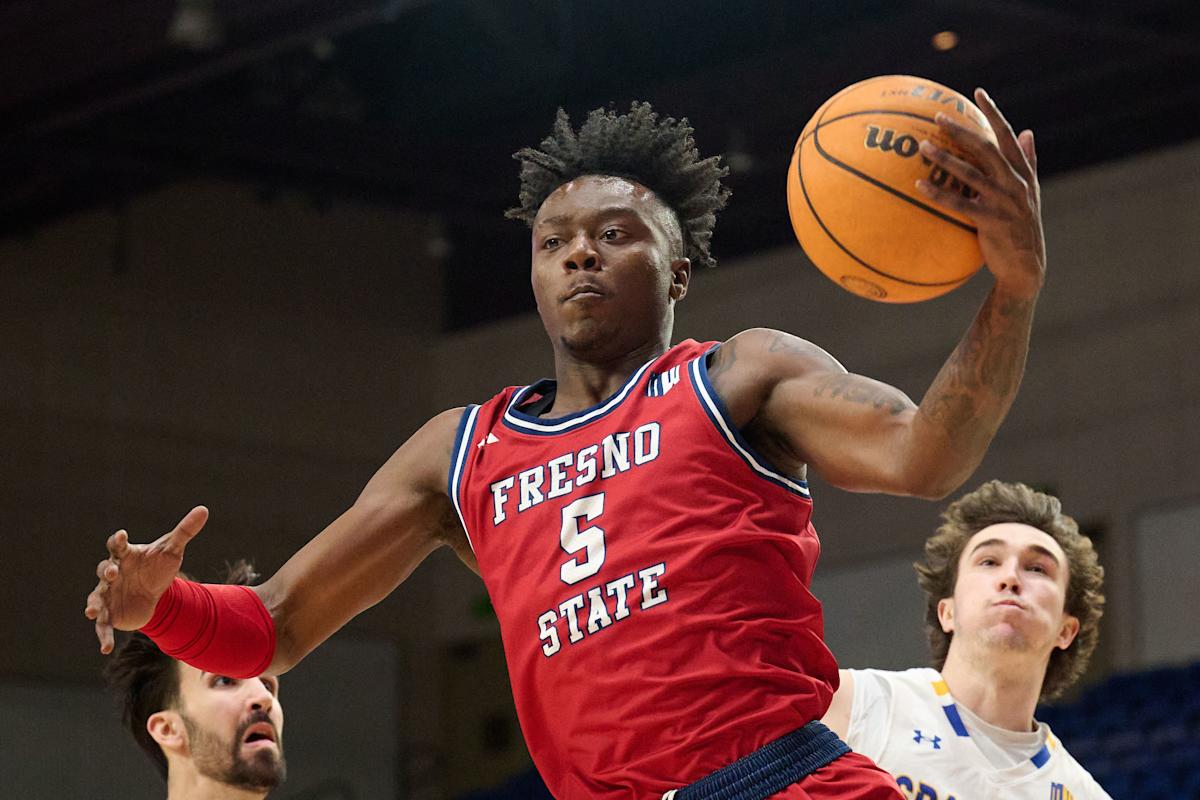 Feb 6, 2024; San Jose, California, USA; Fresno State Bulldogs guard Jalen Weaver (5) rebounds the ball against the San Jose State Spartans during the first half at Provident Credit Union Event Center. Mandatory Credit: Robert Edwards-USA TODAY Sports