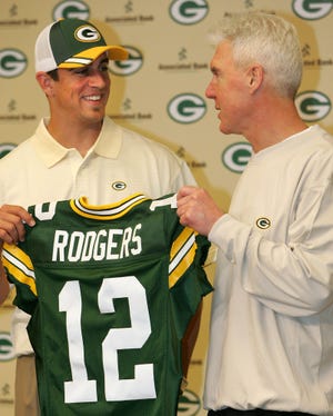 Aaron Rodgers is introduced by Green Bay Packers general manager Ted Thompson after being selected with the 24th pick in the first round of the 2005 NFL draft.