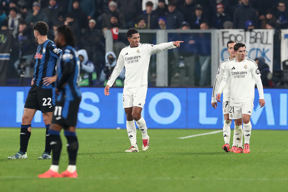 BERGAMO, ITALY - DECEMBER 10: Jude Bellingham of Real Madrid celebrates scoring his team's third goal during the UEFA Champions League 2024/25 League Phase MD6 match between Atalanta BC and Real Madrid C.F. at Stadio di Bergamo on December 10, 2024 in Bergamo, Italy. (Photo by Marco Luzzani/Getty Images)