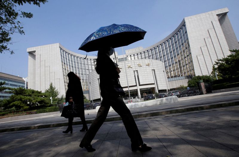 Exclusive-China’s central bank asks state lenders to reduce dollar purchases, sources say