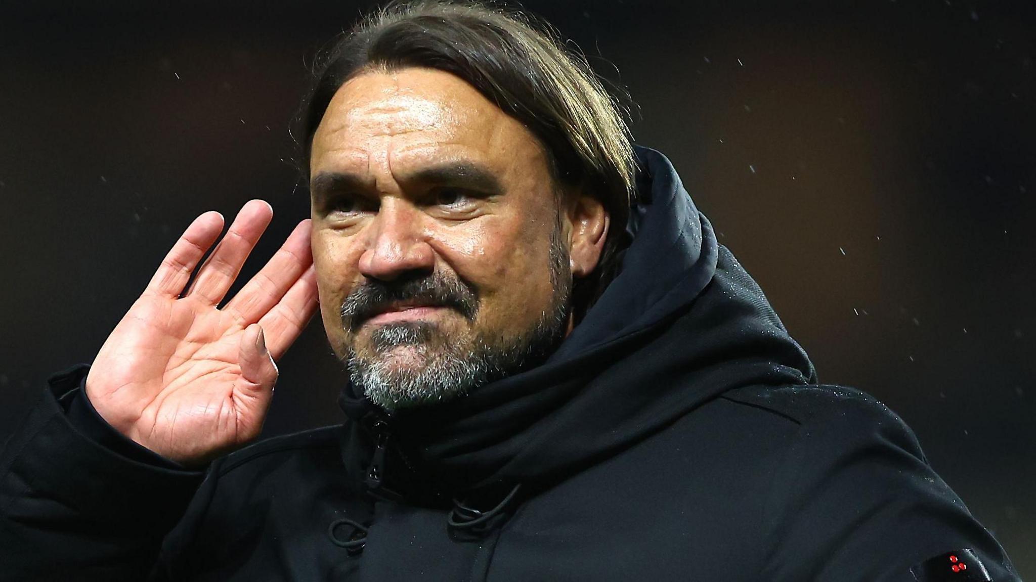 Daniel Farke cups his ear