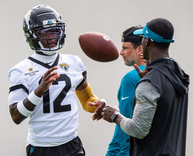 Jacksonville Jaguars wide receiver Travis Hunter (12) is tossed a ball during the Jacksonville Jaguars’ mandatory minicamp Tuesday June 10, 2025 at the Miller Electric Center in Jacksonville, Fla. [Doug Engle/Florida Times-Union]