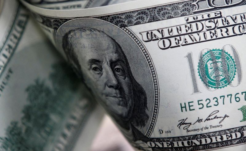 Dollar edges higher with investors focused on labor market data