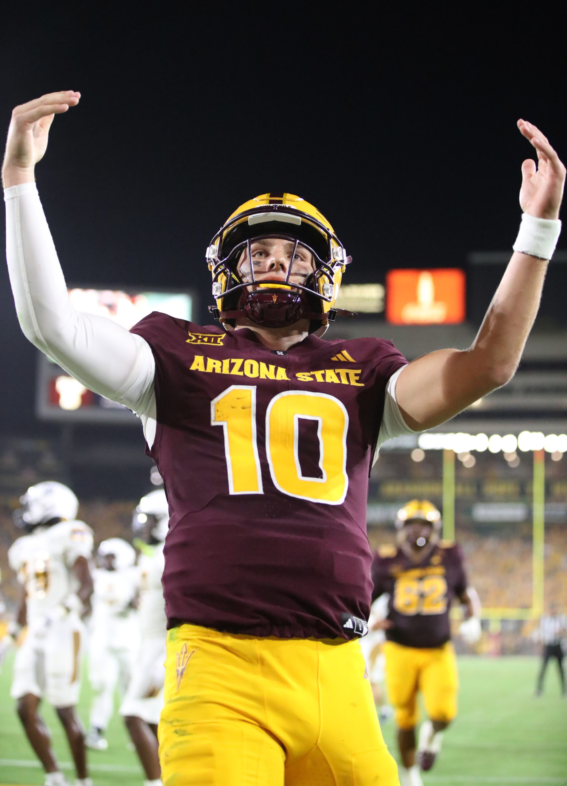 TEMPE, ARIZONA - AUGUST 30: Quarterback Sam Leavitt #10 of the Arizona State Sun Devils celebrates in the endzone after scoring a 18-yard touchdown during the second half of the Northern Arizona University Lumberjacks versus the Arizona State University Sun Devils football game at Mountain America Stadium on August 30, 2025 in Tempe, Arizona. (Photo by Bruce Yeung/Getty Images)