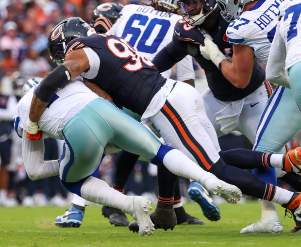 Bears defensive end Montez Sweat sacks Cowboys quarterback Dak Prescott...