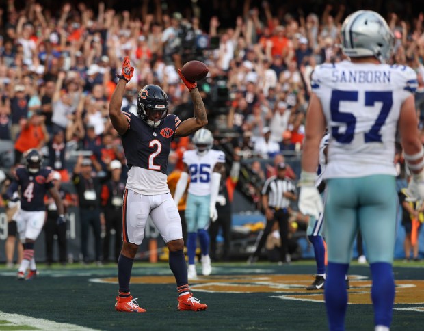 Bears wide receiver DJ Moore celebrates his touchdown against the...